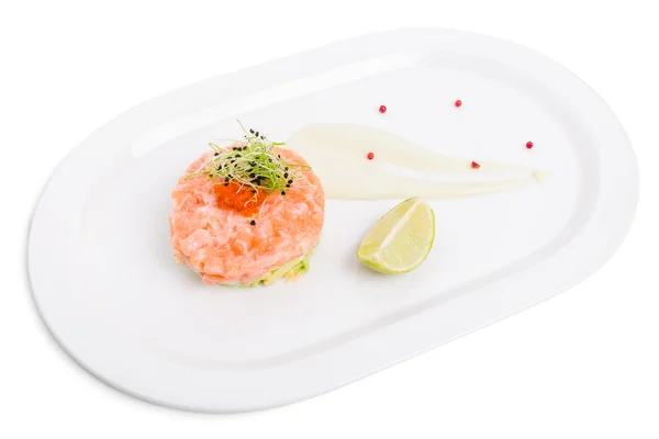 Salmon tartare with avocado and red caviar. — Stock Photo, Image