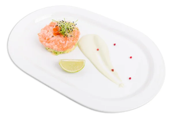 Salmon tartare with avocado and red caviar. — Stock Photo, Image