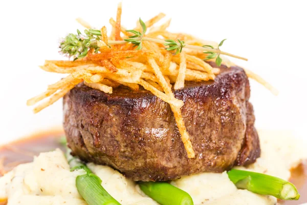 Delicious tenderloin steak with asparagus. — Stock Photo, Image