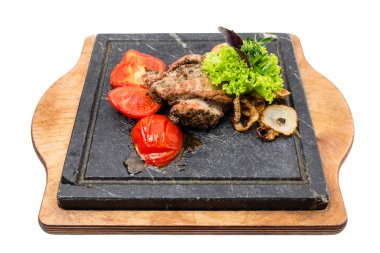 Lezzetli sebzeli ızgara domuz filetosu.