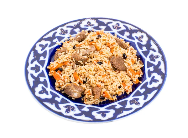 Pilaf fragante con carne y albaricoques secos . —  Fotos de Stock