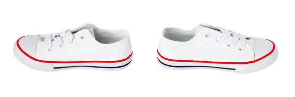 Zapatos de lona blanca con tira roja . — Foto de Stock