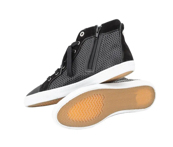 Black perforated leather sneakers. — Stock Photo, Image