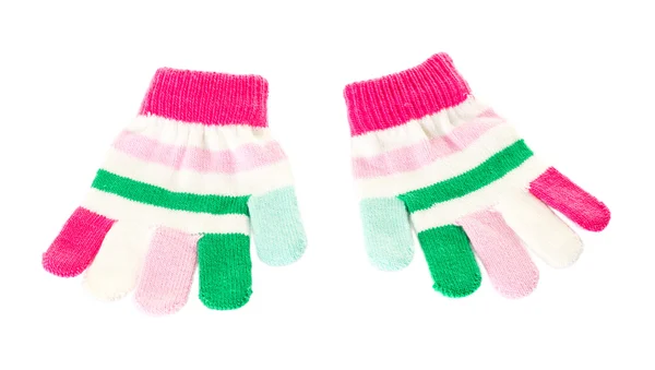 Růžové a zelené vlněné palčáky. — Stock fotografie
