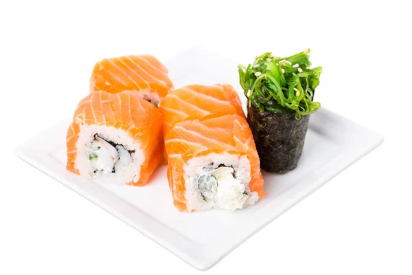 Salmon sushi roll with snow crab and cucumber. — Stock Photo, Image