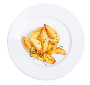 Patates dilimleri kıyılmış dereotu ile pişmiş.