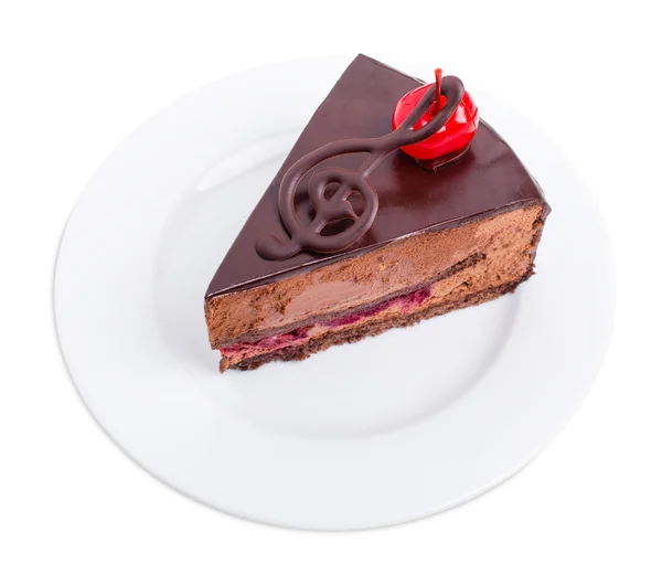 Delicious chocolate cake with cocktail cherry. — Stock Photo, Image