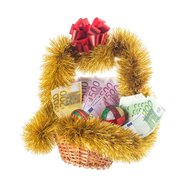 Wicker basket full of euro bills. Stock Image