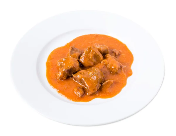 Carne deliciosa em molho de tomate . — Fotografia de Stock