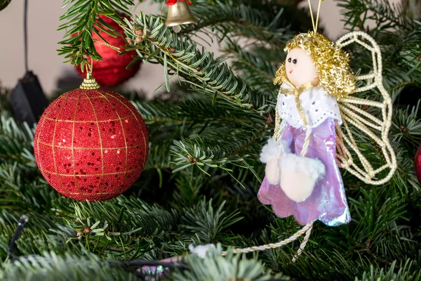 Christmas ball and fairy doll. — Stock Photo, Image