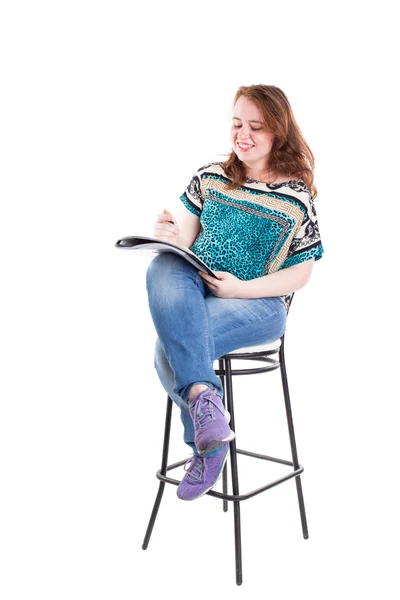 Beautiful redhead plus size model with folder. — Stock Photo, Image