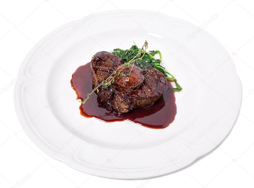 Delicious fillet mignon steak with chard.