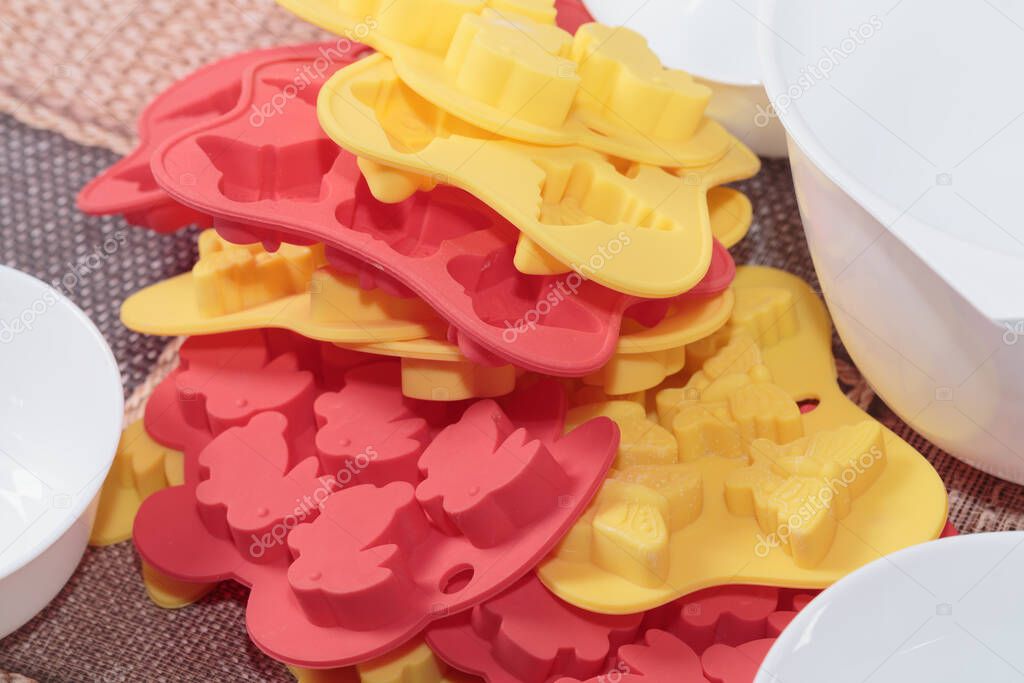 Colorful pastry silicone molds for chocolate and sweets. Close-up.