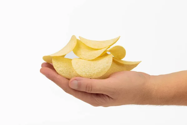 Een Menselijke Hand Houdt Chips Vast Het Geïsoleerd Een Witte — Stockfoto