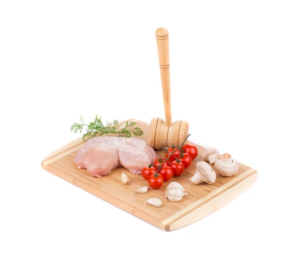 Ruwe kippenborst op de houten bord. — Stockfoto