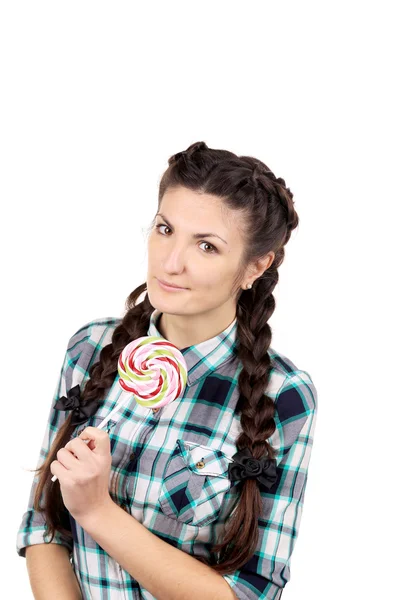 Girl with braids and lollipop. — Stock Photo, Image