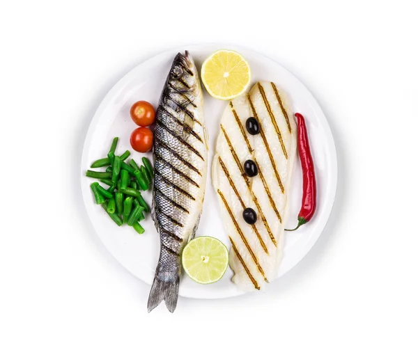 Fish fillet and seabass. — Stock Photo, Image