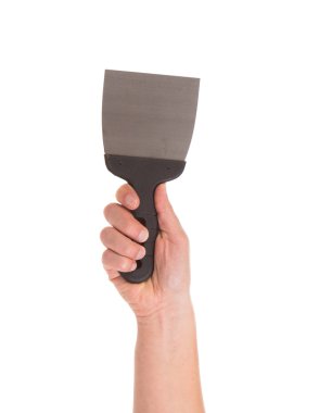 İnşaat spatula el tutar.