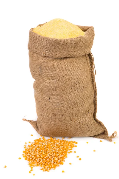 Sack with corn grains and flour. — Stock Photo, Image