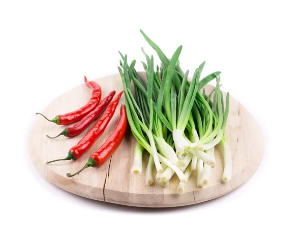 Green onion with red pepper — Stock Photo, Image