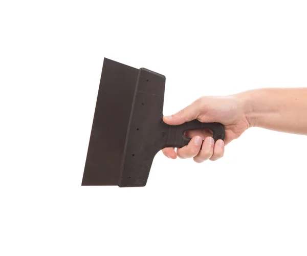 Hand holds construction spatula — Stock Photo, Image