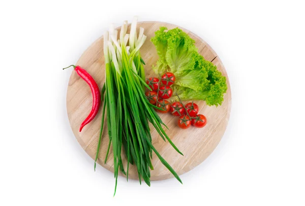 Grön lök med röd paprika — Stockfoto