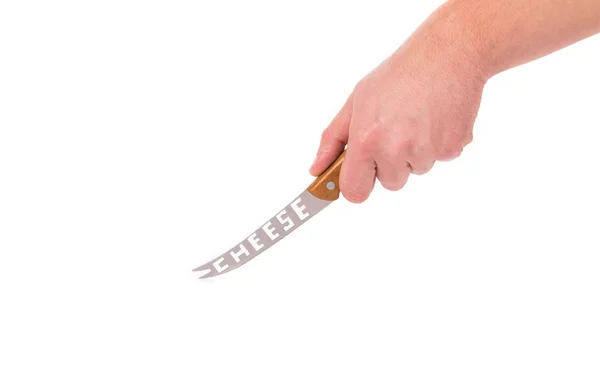 Ręka trzyma nóż do sera — Zdjęcie stockowe