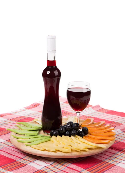Wine and cheese plate. — Stock Photo, Image