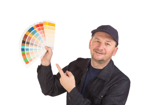 Worker with color samples. 