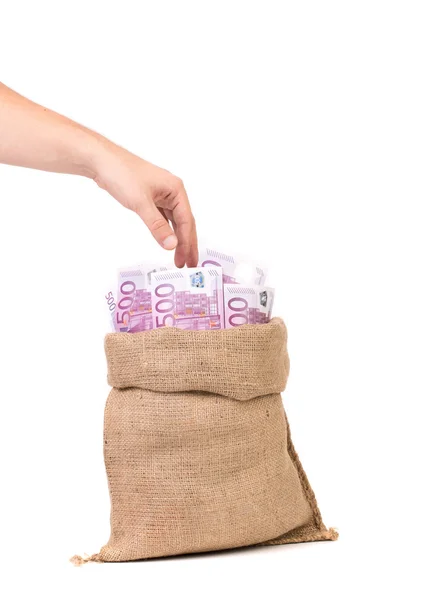 Hand with money bag — Stock Photo, Image