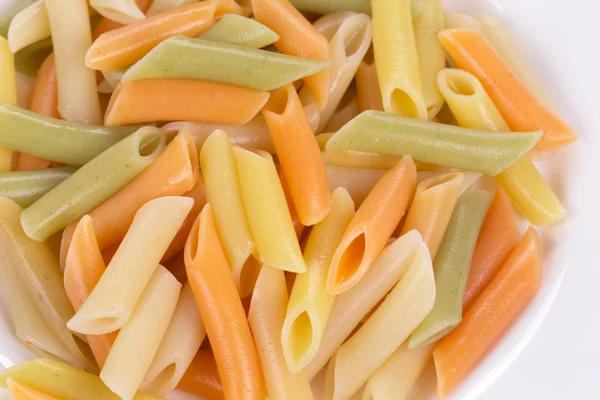 Färgad pasta penne — Stockfoto