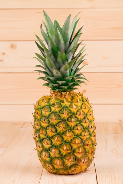 Fresh pineapple on wooden table. — Stock Photo, Image