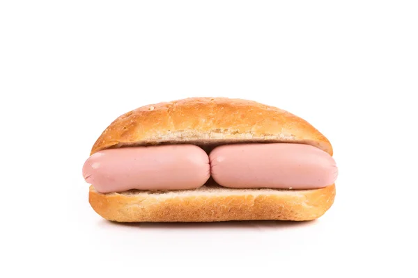 Hand houdt hotdog — Stockfoto