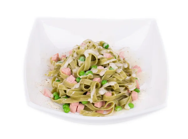 Pasta tagliatelle with green peas — Stock Photo, Image