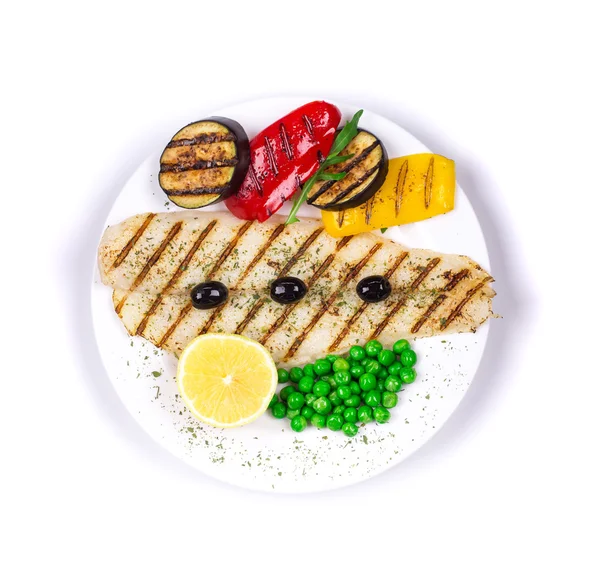 Grilled fish fillet with tasty vegetables. — Stock Photo, Image