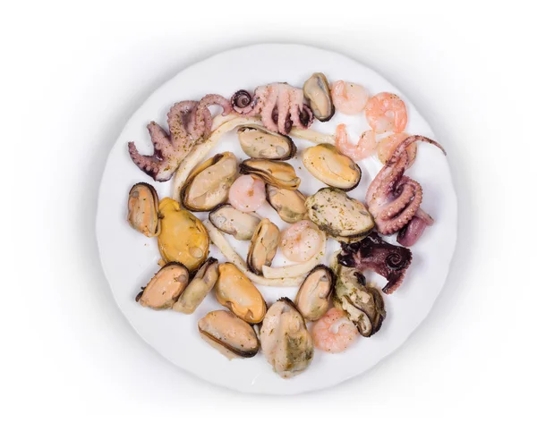 Makanan laut yang lezat di piring bundar . — Stok Foto
