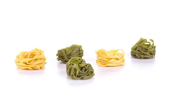 Suchý tagliatelle hnízda — Stock fotografie