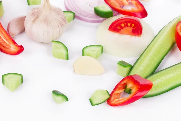 Produtos hortícolas frescos em fatias . — Fotografia de Stock