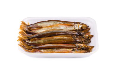 Smoked fish on a plate clipart