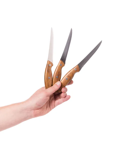 Hand holds three knifes. — Stock Photo, Image