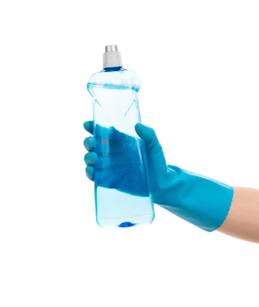 Mano nel guanto tenendo bottiglia di plastica blu . — Foto Stock