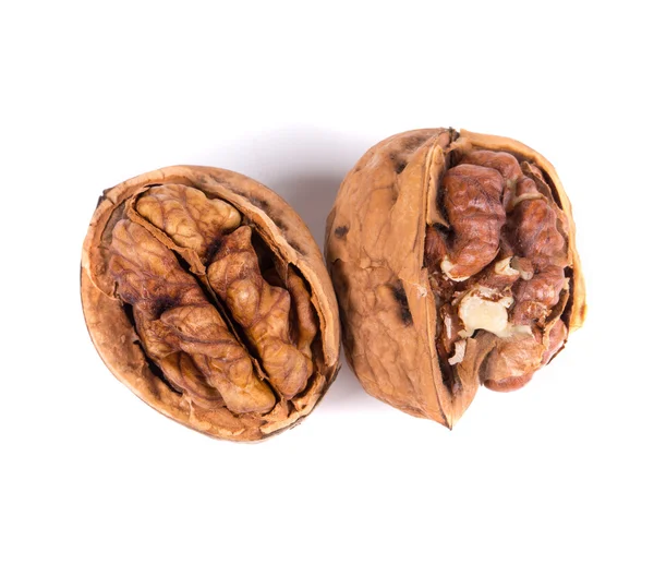 Gebarsten walnoten op een wit — Stockfoto