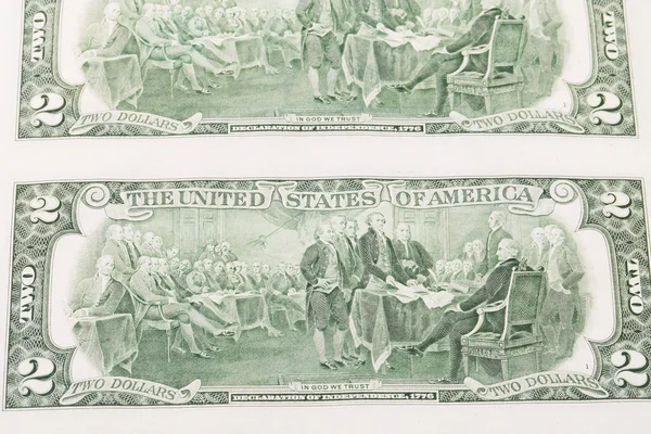 Background of two-dollar bills — Stock Photo, Image