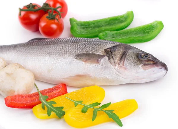 Fresh seabass and vegetables — Stock Photo, Image