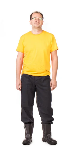 Trabalhador em vestuário de trabalho amarelo — Fotografia de Stock
