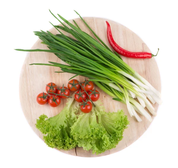 Onions and cherry tomatoes — Stock Photo, Image