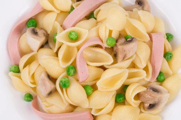 Italian pasta with ham and mushrooms — Stock Photo, Image