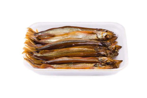 Rökt fisk på en tallrik — Stockfoto