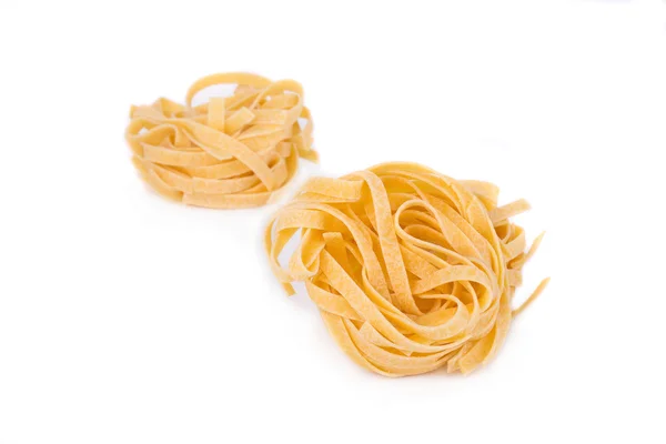 Dry tagliatelle nest. — Stock Photo, Image