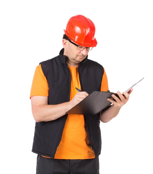 Trabajador escribiendo en carpeta . —  Fotos de Stock